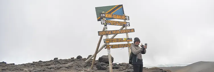 Summit Day - From School Hut Camp to Uhuru Peak and Millenium Camp.