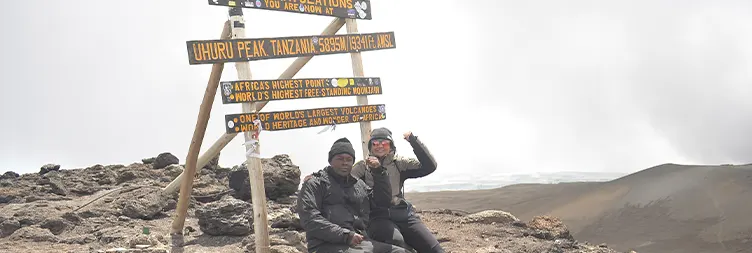School Hut â€“ Uhuru Peak (Summit Point) â€“ Mweka Camp Trekking up to summit Mt Kilimanjaro 
